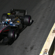 A photo of Juri Vips racing his silver Hitech GP car in Baku.